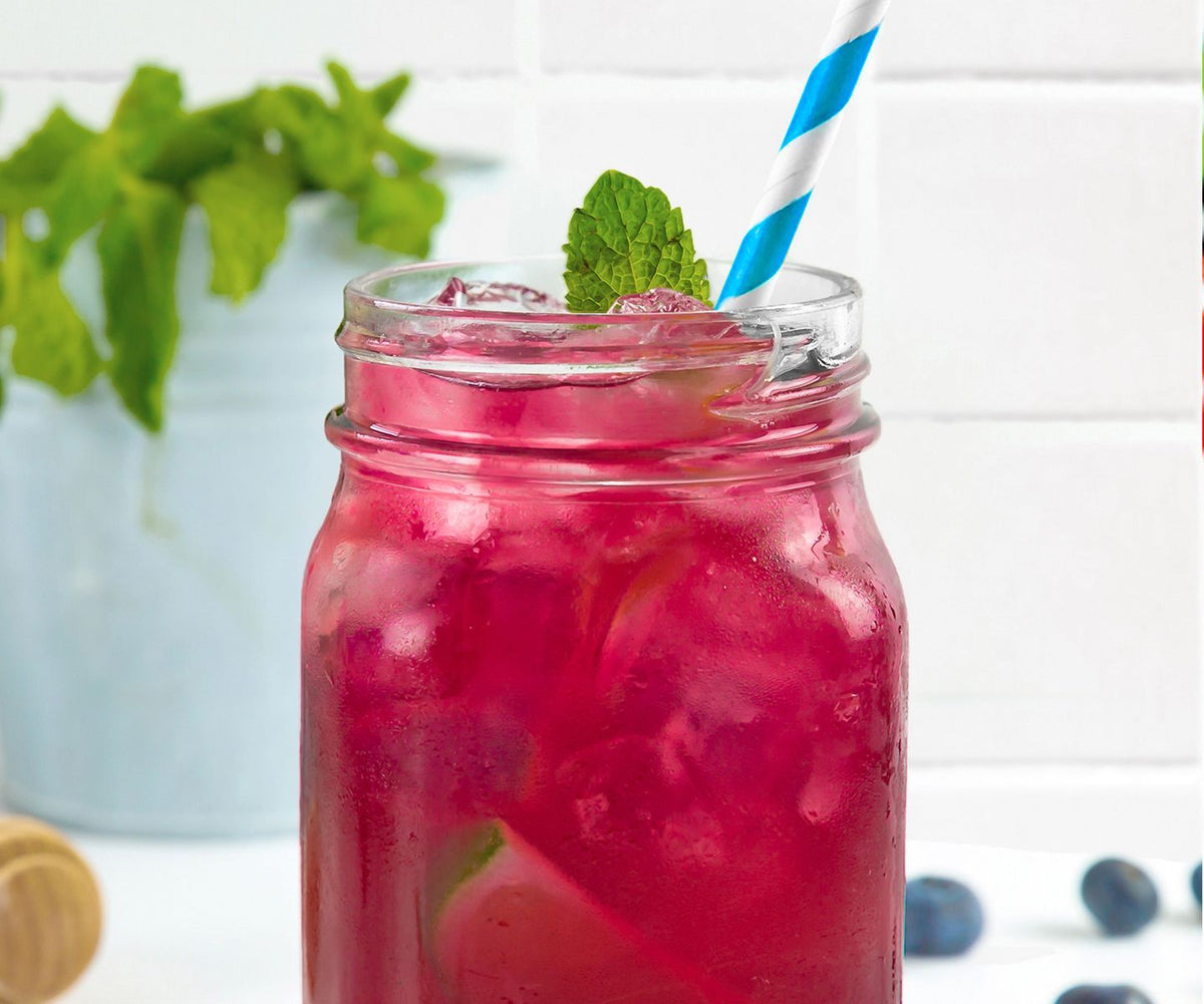 Cocktail bleuets sauvages, lime et menthe