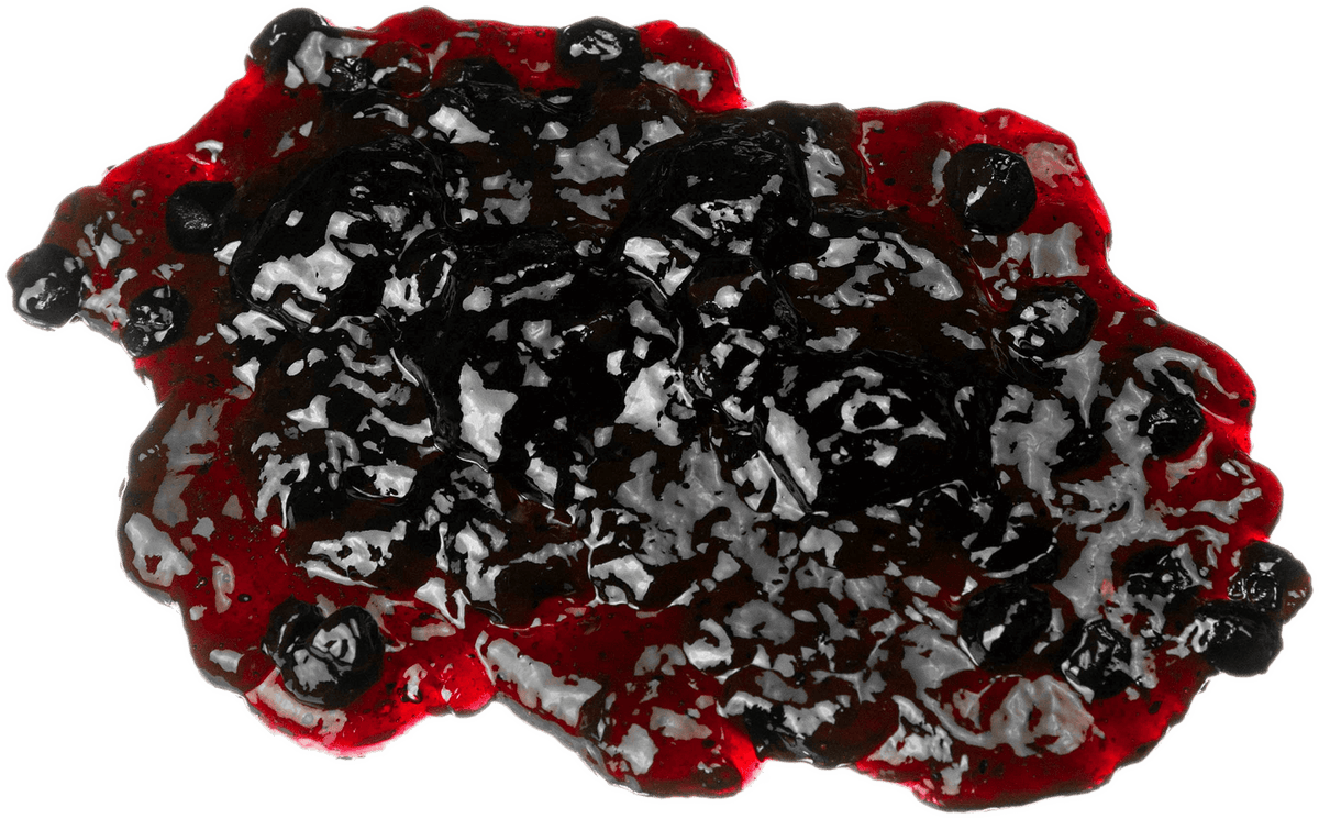 A close-up of a glossy dark berry preserve or jam with red edges and visible whole blueberries, isolated on a black background.